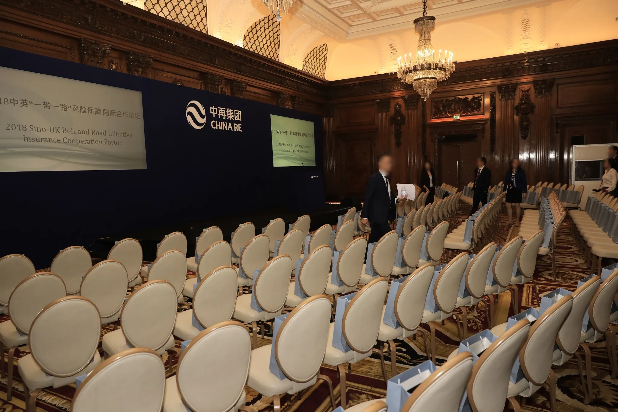 The ballroom set with rows of chairs facing the stage before guests arrived