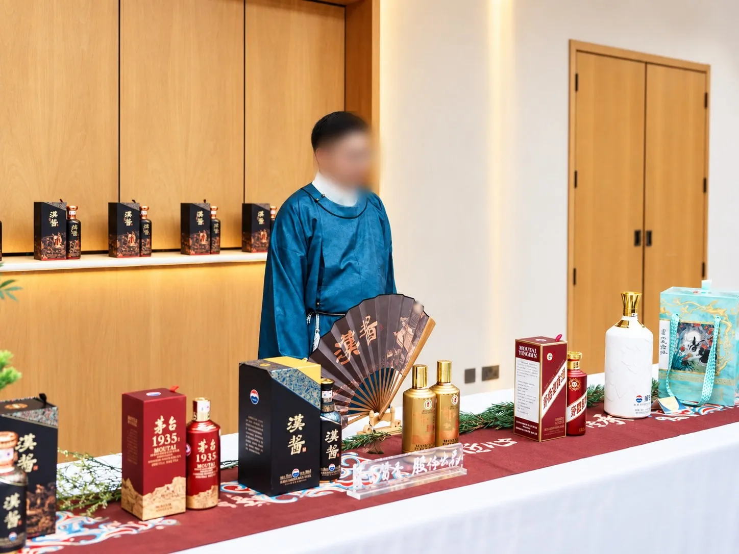 The Hanjiang product showcase, hosted by a member of staff in traditional dress
